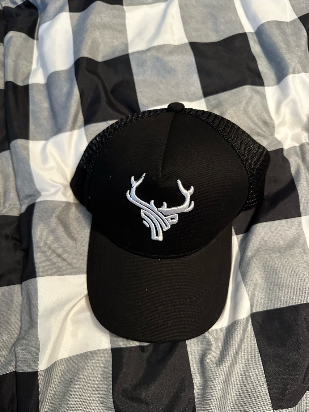 Black Trucker Hat with White Antler Logo